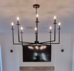 chandelier and wall sconce installed in a Tamworth home